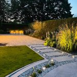 Luxury Landscaping Yorkshire. Porcelain Paving meticulously selected to match existing Granite Cobble Driveway